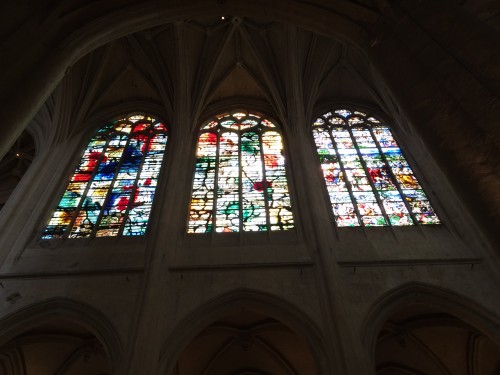 Windows of St. Gervais. It's a bit hard to see, but the left and middle windows are definitely more modern than the one on the right.