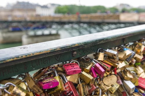 Close up of padlocks. So how did Romeo and Juliet get to Paris?